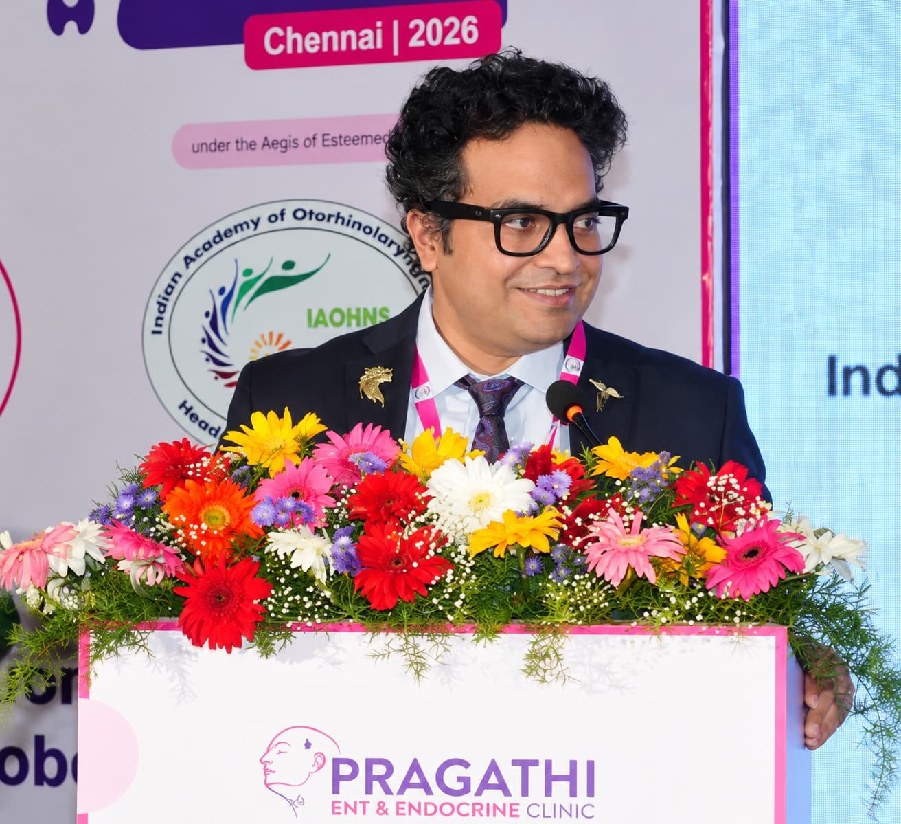 Dr. Radhamadhab Sahu delivering podium address at IAOHNS Chennai 2026